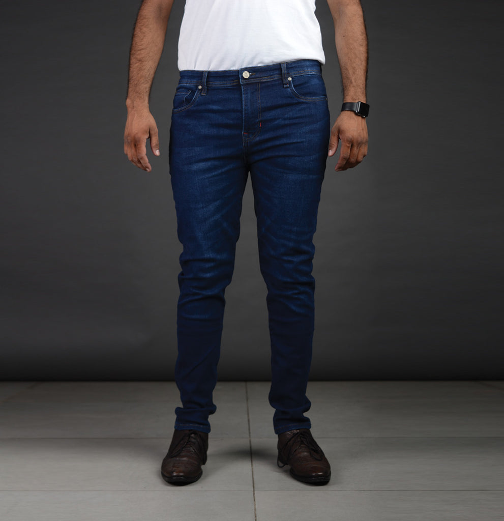 Skinny Fit Dark Blue Men Jeans - A pair of stylish men's jeans in a skinny fit, featuring a dark blue wash. The jeans have a sleek and form-fitting design, perfect for modern fashion-forward looks. The dark blue color adds a touch of sophistication and versatility, making them an essential addition to any man's wardrobe."